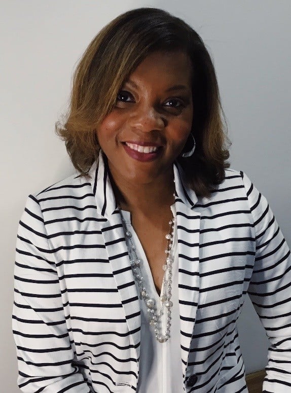 Nicole Mills, Principal