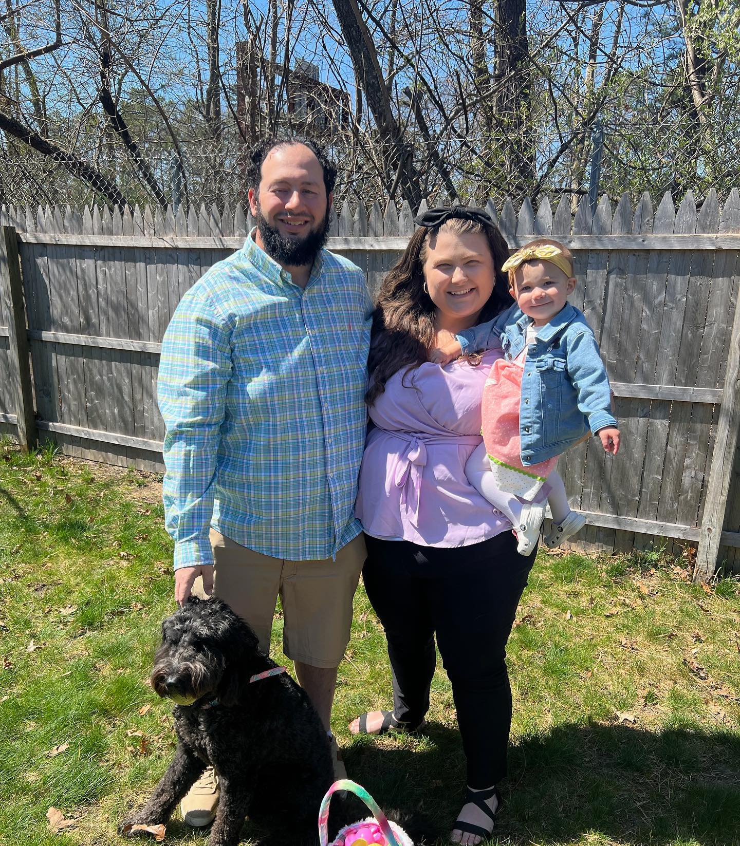 picture of mrs. shore, her husband, baby and dog